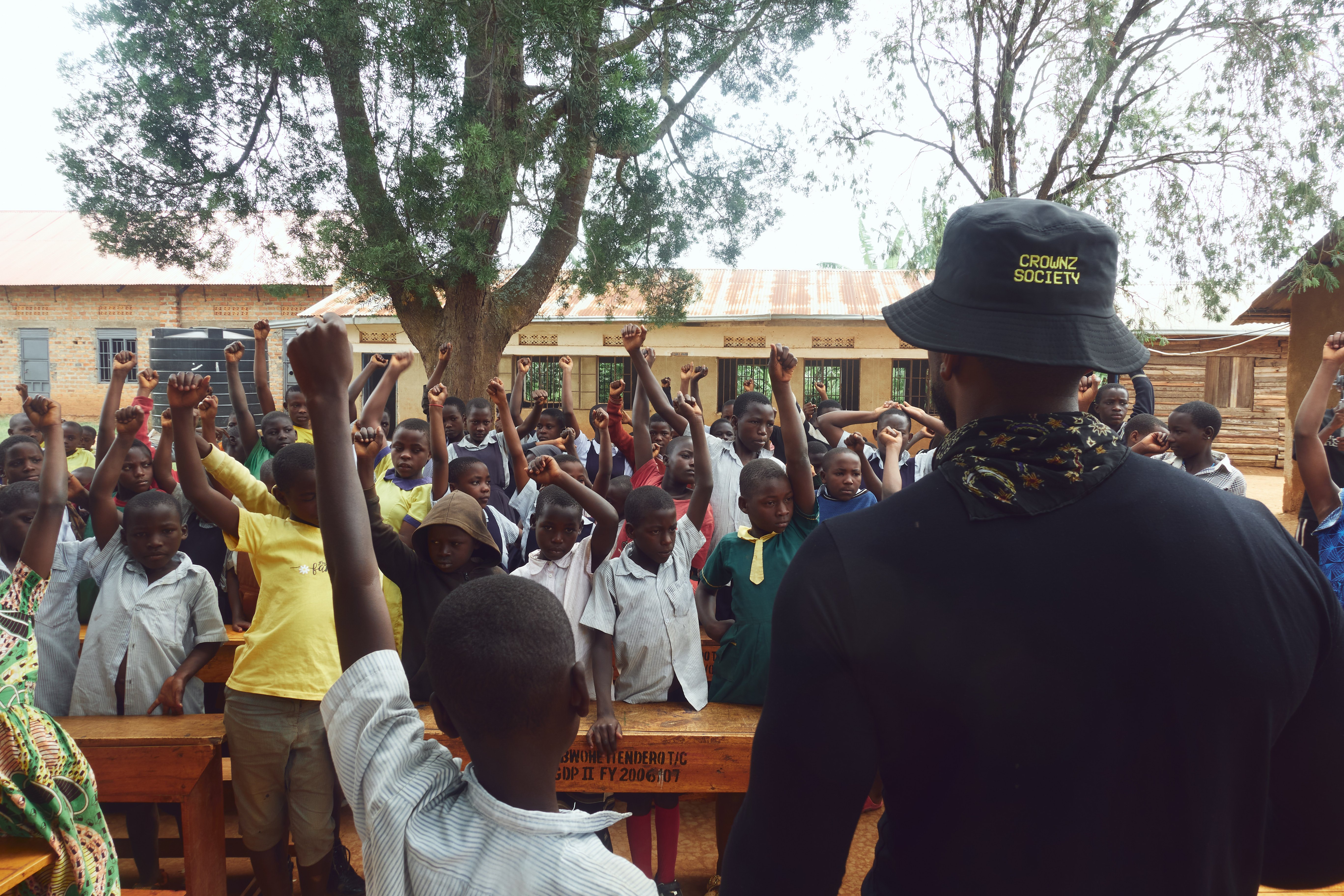 19Keys addressing students with hands raised